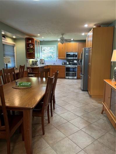 Dining room wall was removed to make a large combo kitchen and dining room