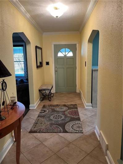 Lovely tiled entry way from 24x7 front porch