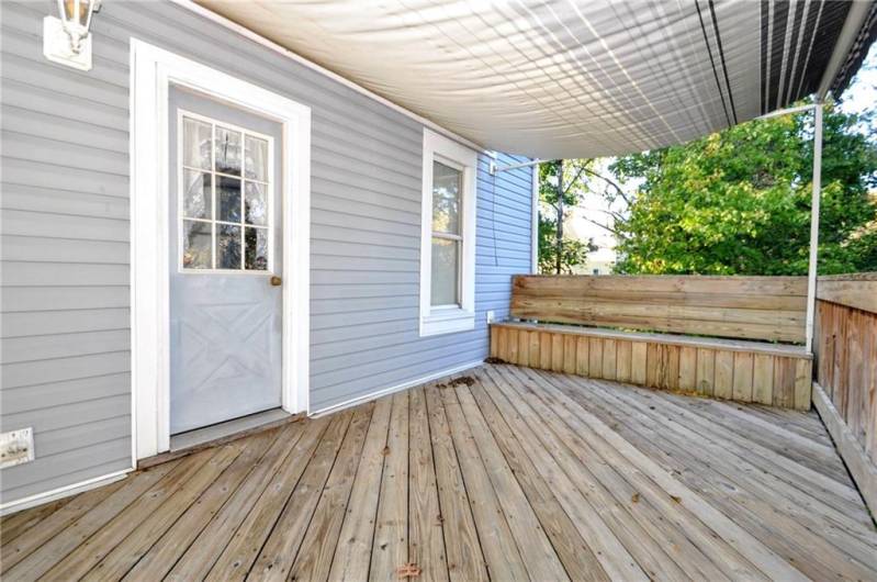 the back deck that leads to the kitchen area