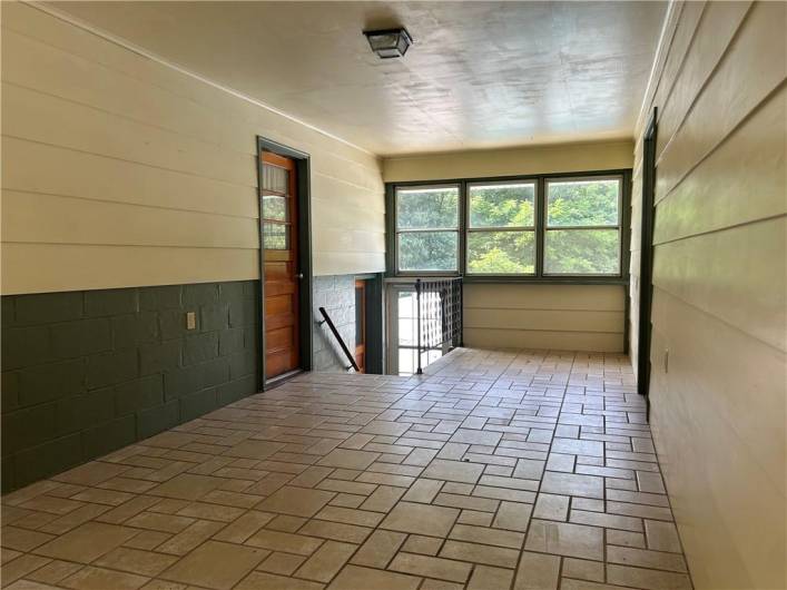 Another view of the breezeway, door ahead leads to pool area.