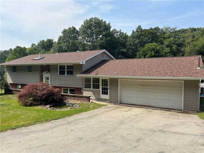 Home, breezeway and 27x22 garage!