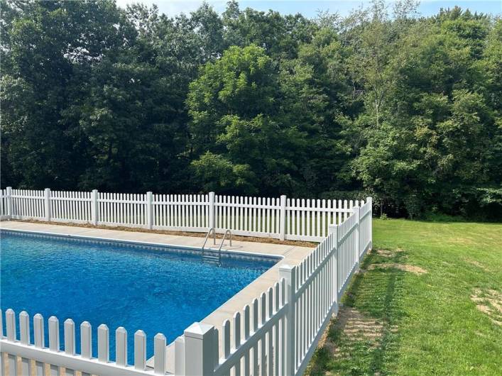 Pool and woods to rear of the property!  Stream at the rear of the lot