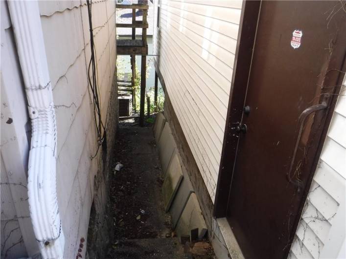 Between garage and house