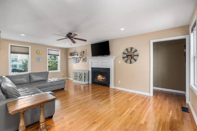 Entrance to the main floor master bedroom is located off the living room