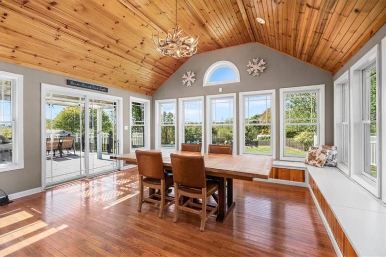 Beautiful wood cathedral ceiling. Built in window seat with storage.