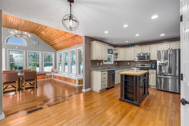 Additional dining space off sunroom and kitchen