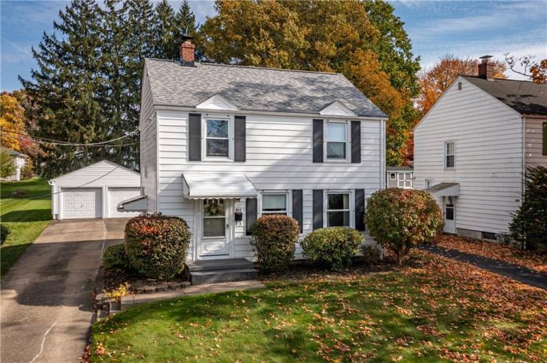 Front, 2 car detached garage, fresh landscaping