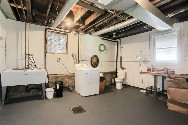 Basement showing included laundry appliances.