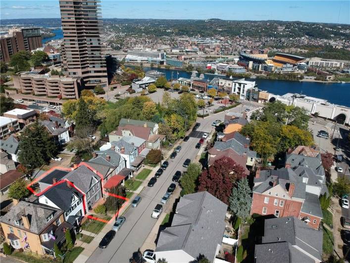 Aerial view of the property showing the proximity to the city.