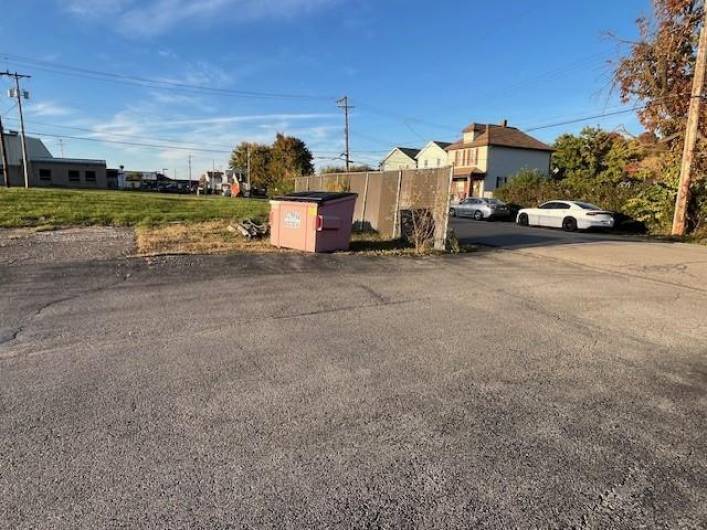 dumpster area and entrance to building