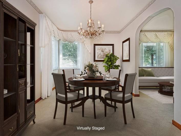 Enjoy family and guests gatherings in your spacious dining room. Lots of natural sunlight fills the room.