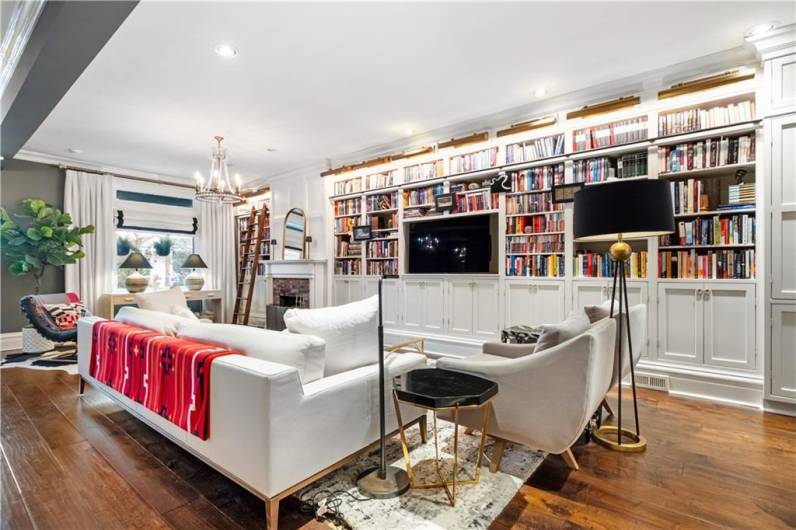 Recessed lighting, wide planked flooring and airy spaces through the main floor.