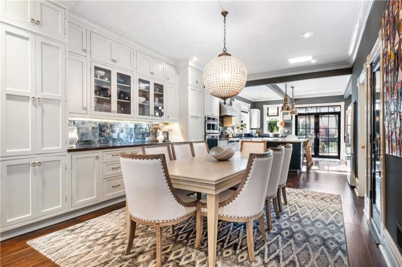 Dining area leading into the kitchen.