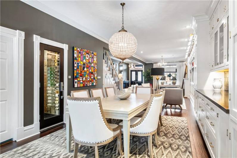 Open dining area with built in cabinetry.