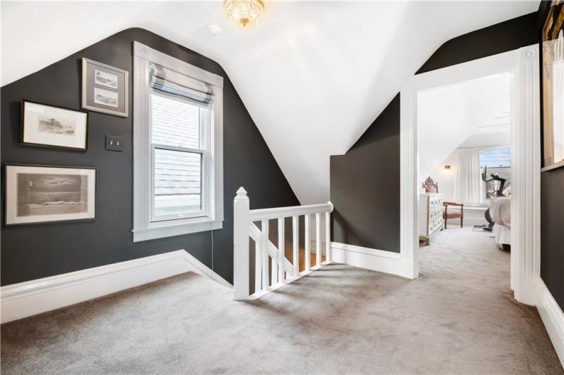 Spacious third floor hallway. Added split in third floor and skylights.