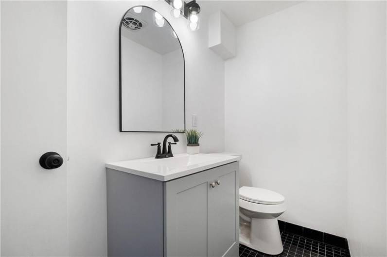 NEW Ceramic Powder room in Entry off of Family room