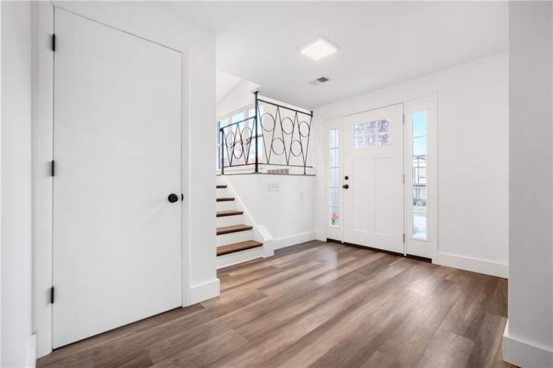 11’x11’ Central Foyer with NEW Double Side-lite and Window Door Open to Living and Family rooms