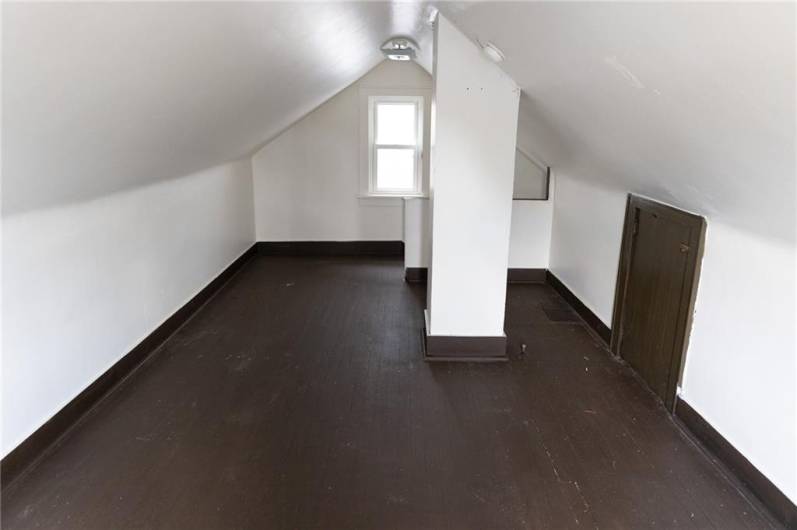 Attic loft space could easily be made into additional bedroom, family room or office.