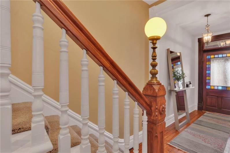 Main floor staircase with bannister.