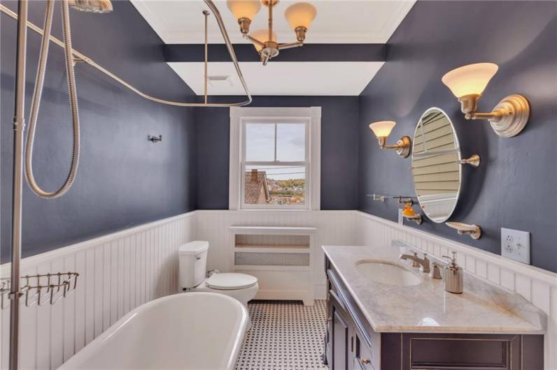 2nd floor full bath with ceramic tile and clawfoot tub