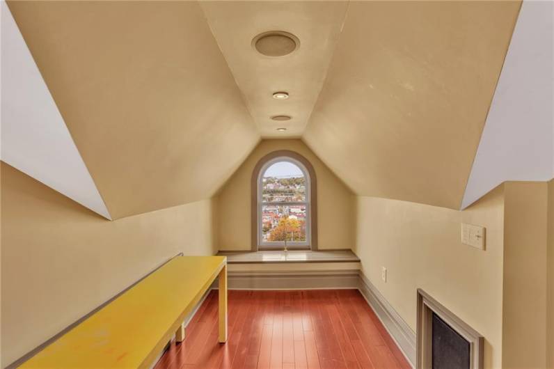 Cozy nook with a custom radius window.