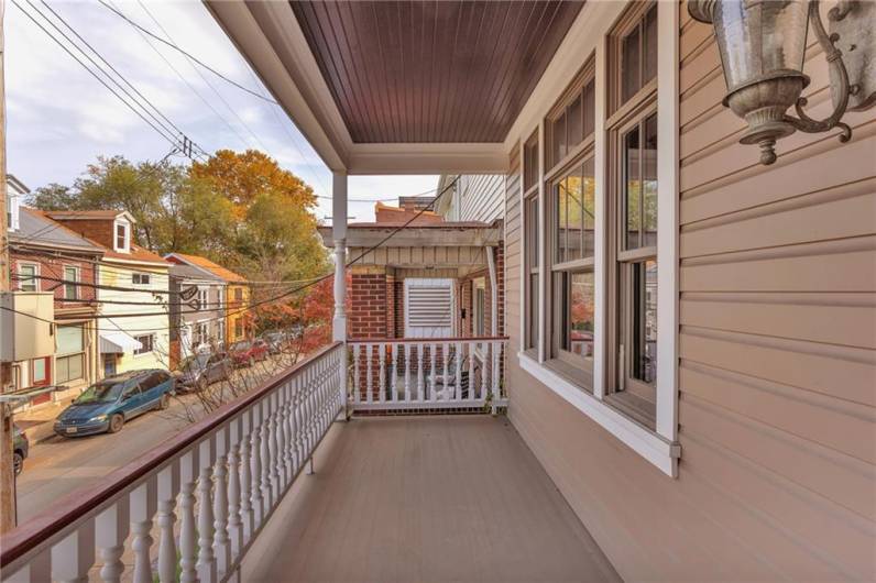 Composite decking, with access to 18th street city stairs across the street.