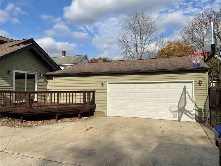 THREE CAR WITH TWO DOORS, 24 X 37 CONCRETE PAD