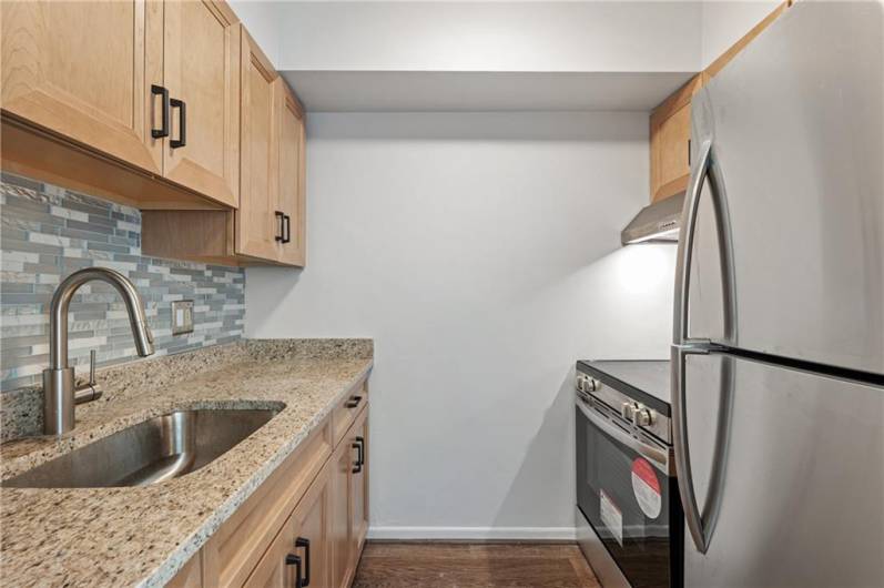 Brand new stainless steel appliances.