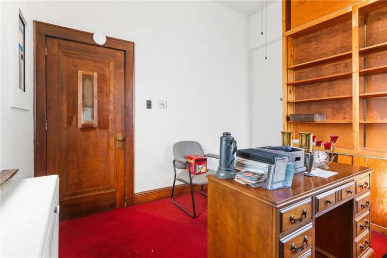 office with built in shelving.