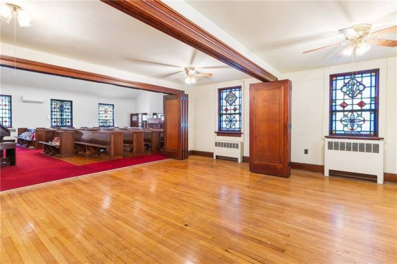 Expansion area includes 2 folding wood doors.