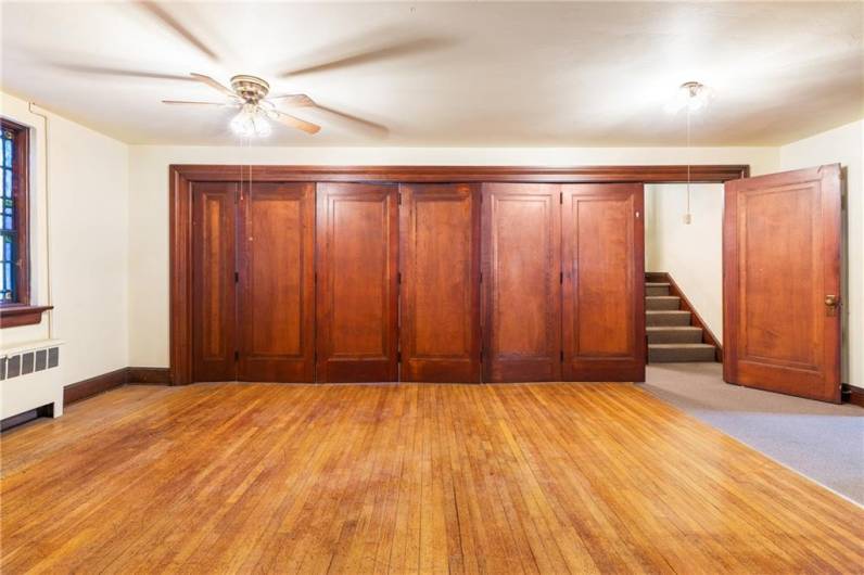 Partition this area off into 1 or 2 rooms.