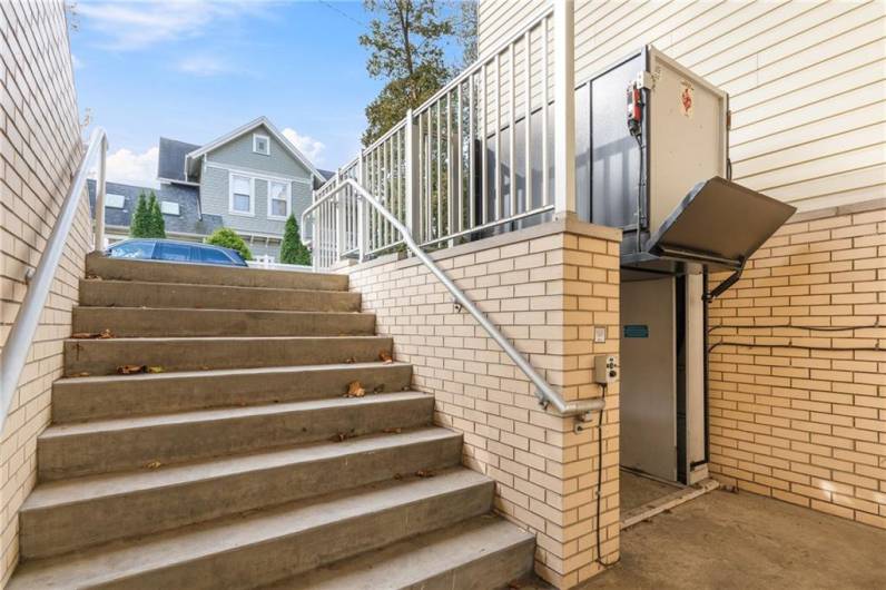 Elevator & stairs to basement level.