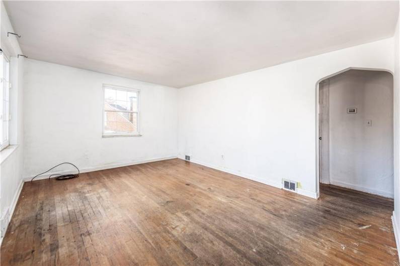 Large main living room with tons of natural light.