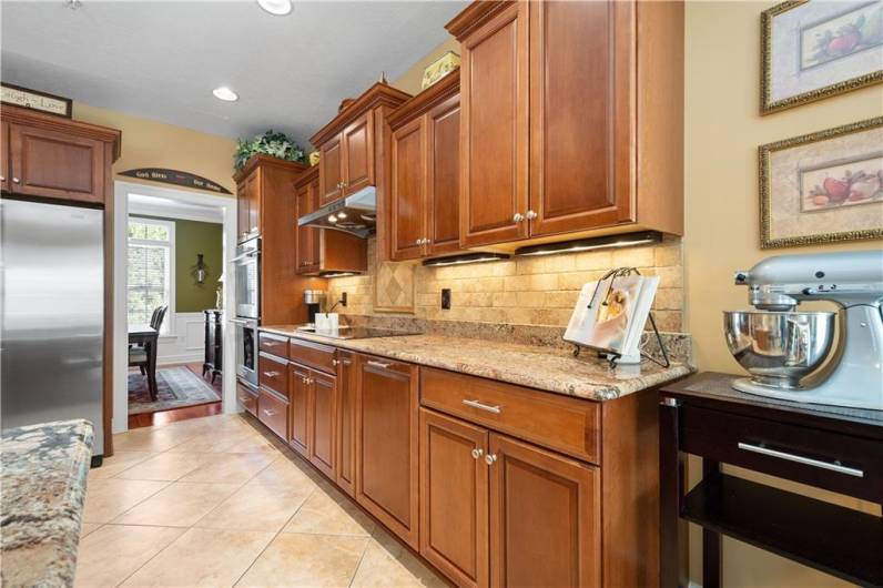 The kitchen features abundant counter space and generous cabinetry.