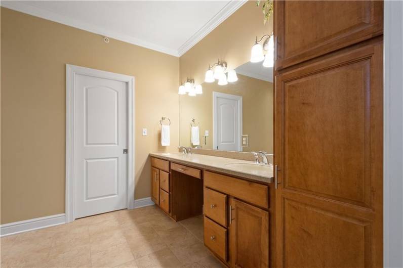 Get ready for a storage extravaganza! This primary bathroom is a dream come true with loads of gorgeous space and double sinks, all conveniently located right next to the primary bedroom.