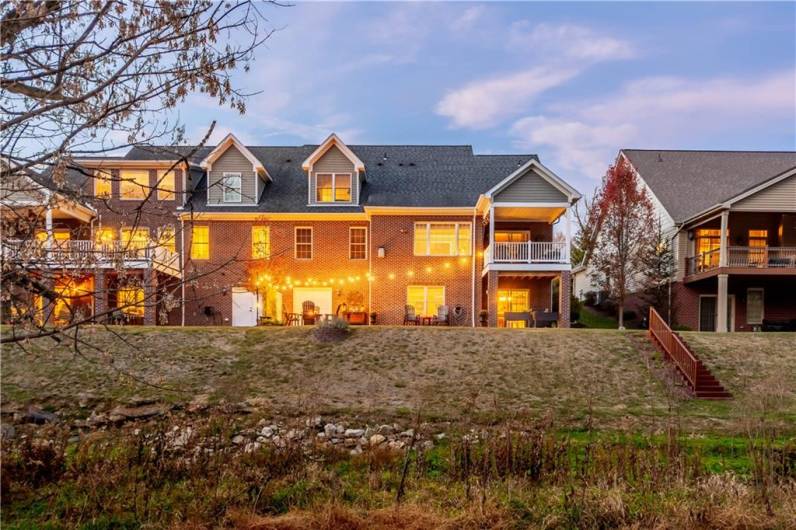 A comprehensive view from the rear of the home reveals ample space to enjoy the outdoors.