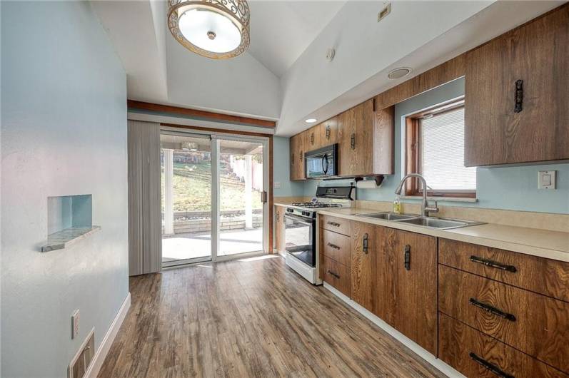 Sliding back doors lead to the private back patio