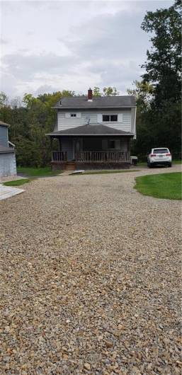 View of Back! Outdoors is where you will want to me.  Covered Back porch