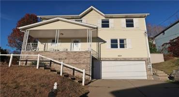 2070 Square Feet of Living Space + 750 Square Feet with 3 Additional Unfinished Rooms in Walk-out Basement