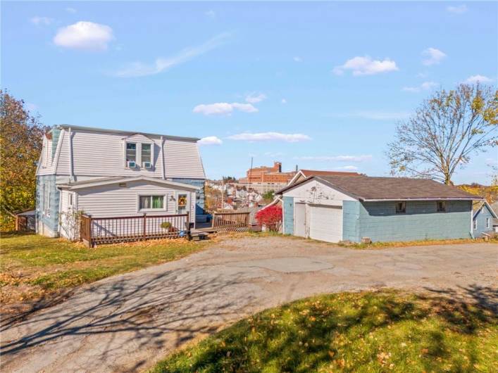 rear deck to enjoy your morning coffee and detached garage