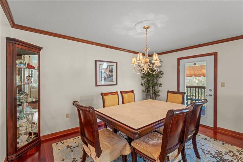 Dining Area 14x9 with a Walk out to Covered Deck and Backyard.