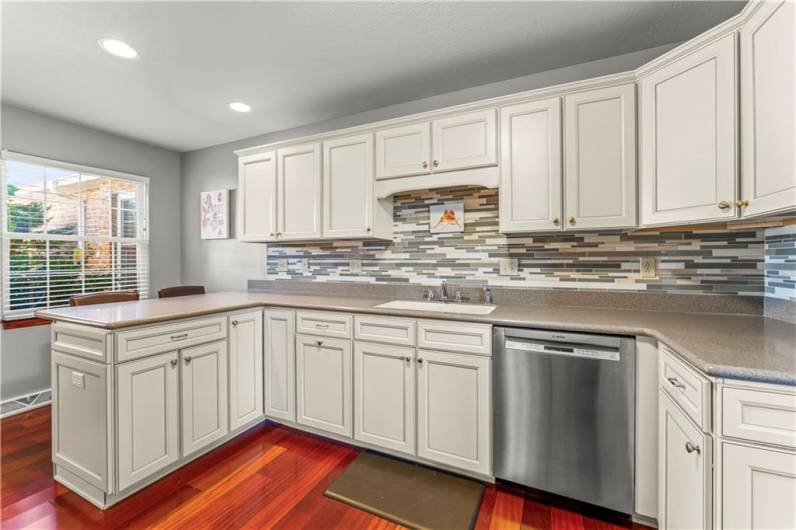 Kitchen You'll love this backsplash matches perfectly. Hardwoods throughout the First Floor.