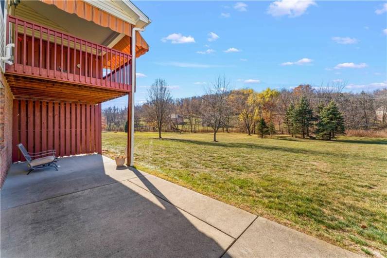 Backyard Deck from the Dining area and the walkout off the lower level.