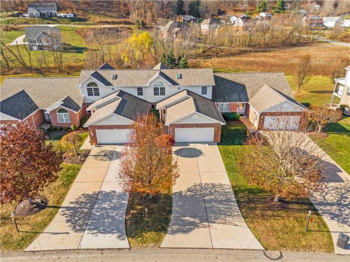 Aerial Front of the Home BRAND NEW ROOF just installed, Concrete Driveway 2 Car Garage