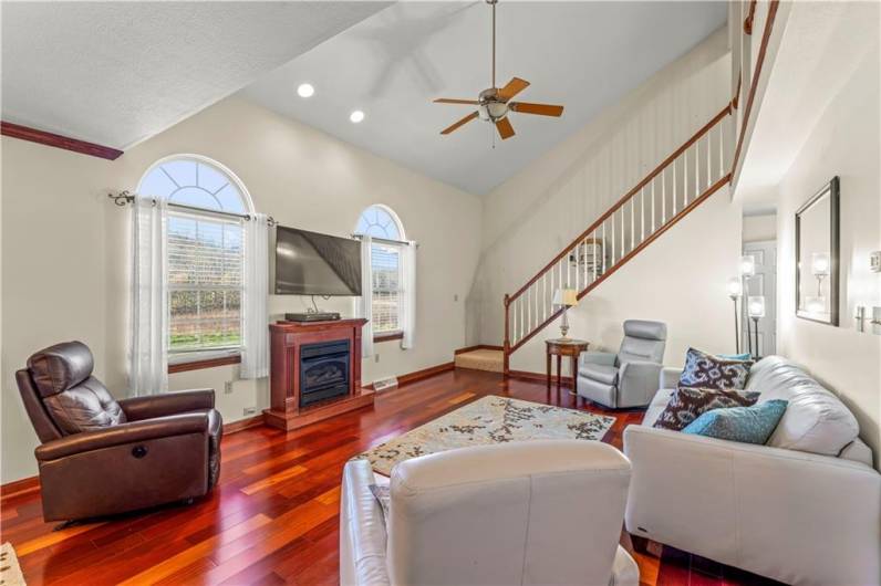 Wow!! Check out this Space Vaulted ceilings, Hardwood Floors Catwalk overlooks the room. Recessed Lighting and ceiling fan.