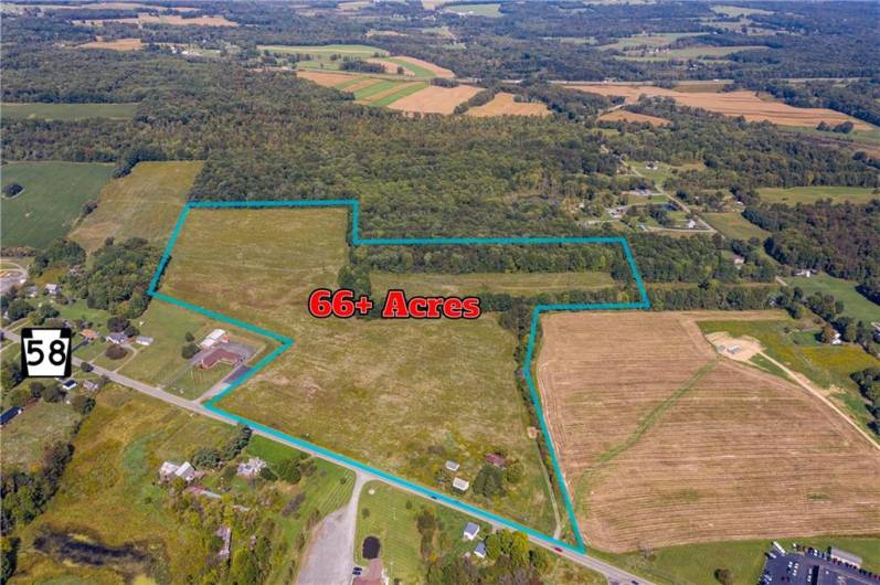 66+ Acres, commercial potential or residential development possibilities. Prior farmland