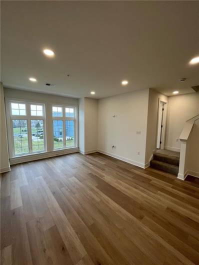 Wall of windows highlights the family room