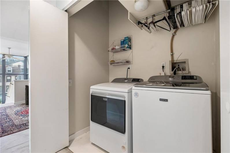 2nd floor laundry, mechanical access, and utility closet makes this a perfect spot for stress-free urban living. Hot water heater replaced in 2023, wash/dryer replaced 2024