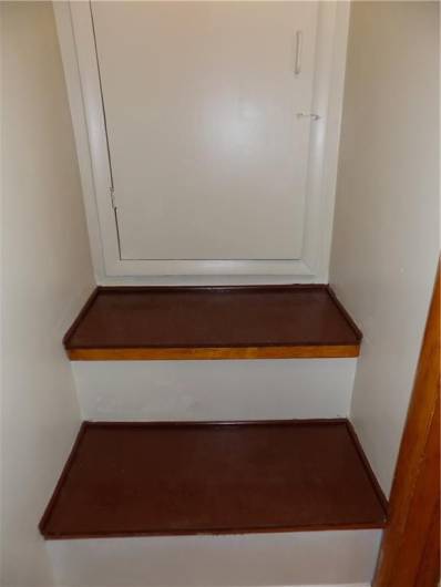 Attic stairs in 2nd bedroom closet.