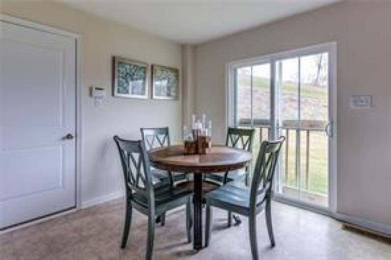 Breakfast area overlooks back yard.